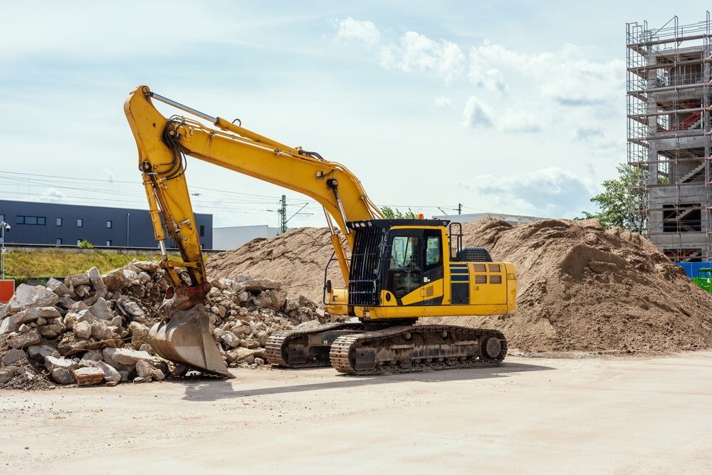 Yellow,Excavator,On,A,Construction,Site.,Also,Called,Diggers,,Jcb,
