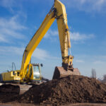 A,Large,Yellow,Crawler,Excavator,With,An,Arrow,And,A
