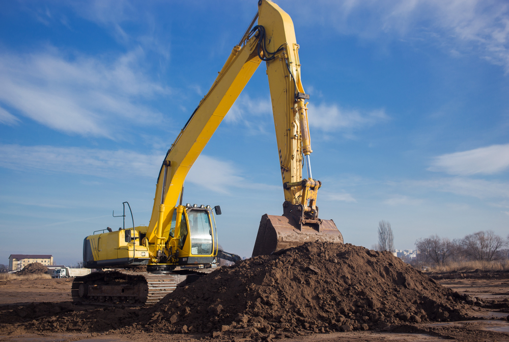 A,Large,Yellow,Crawler,Excavator,With,An,Arrow,And,A