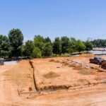 Heavy,Machinery,Is,Shaping,Land,In,Trenches,For,Foundation,At