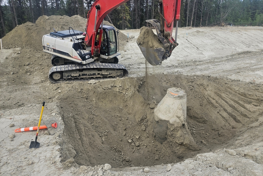 Whitehorse,,Yukon,,Canada,,June,29,,2025:,Excavator,Exposes,Precast,Sanitary