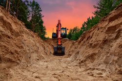 Excavator,Dig,Trench,At,Forest,Area,On,Amazing,Sunset,Background.